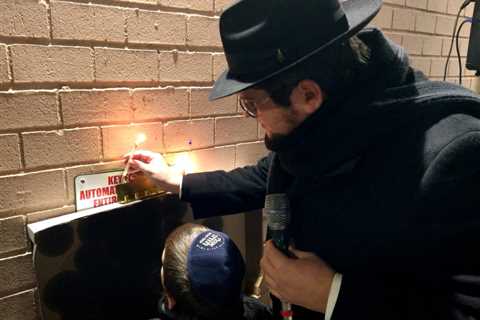 First night of Hanukkah celebrated on Neptune Avenue
