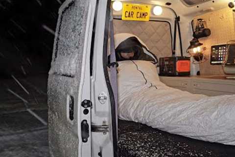 Snow car camping in heavy snowfall area. A night of enjoying solitude in a small car.